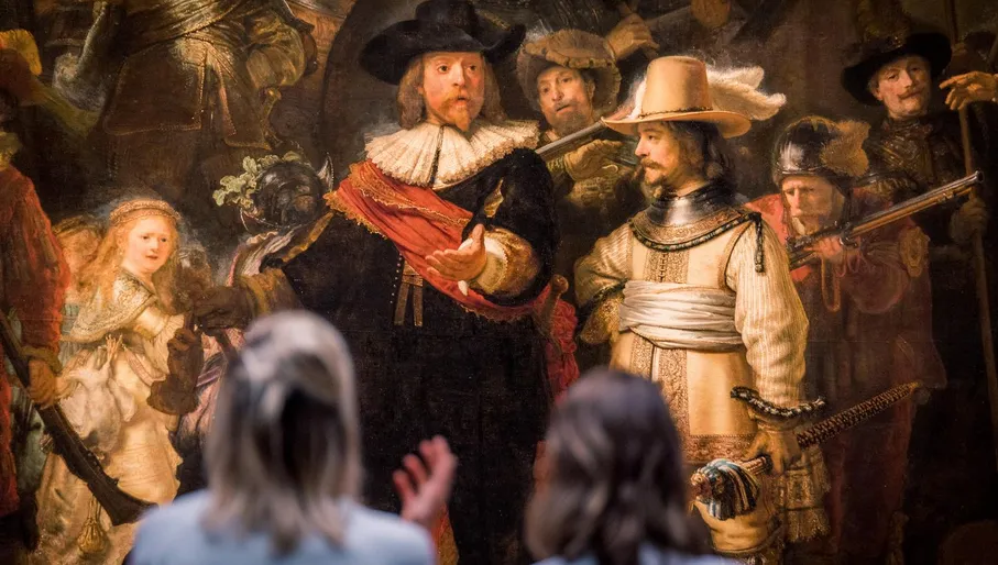 Rembrandt's iconic The Night Watch masterpiece displayed at the Rijksmuseum in Amsterdam.