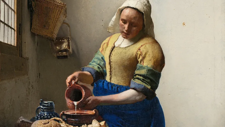 Johannes Vermeer's iconic painting The Milkmaid, a must-see artwork at the Rijksmuseum in Amsterdam.